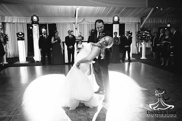 Luke & Brittany striking a pose during their wedding dance choreographed by Dance A Lot Ballroom Studio